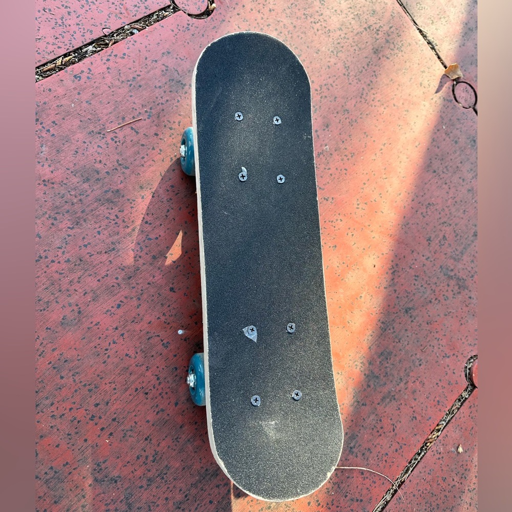 A skateboard.Perfect for 6-8 years old boys and girls. Not heavy, easy to carry.